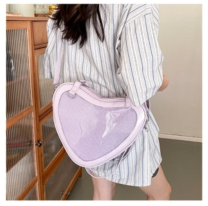 Detail of lavender heart-shaped JK uniform ita bag with a clear window for badges