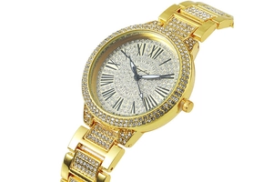 Detail of gold quartz watch with rhinestones, roman numerals and merryshirl dial