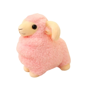 Pink plush stuffed sheep doll with beige horns in a cute four-legged standing posture