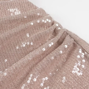 Sparkly sequins and glitter texture on nude beige mesh party dress for women
