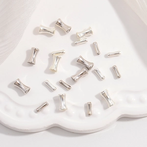 Macro detail of S925 sterling silver bamboo style spacer beads for DIY jewelry making