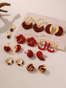 Detailed collection of vintage red enamel and 18k gold-plated earrings in various shapes