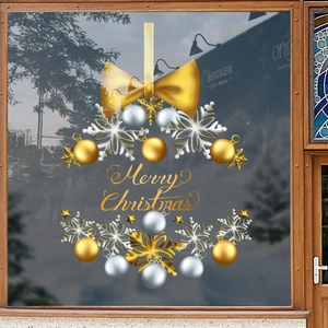 Golden and silver Christmas ball static window decals with Merry Christmas text on glass