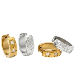 Gold and silver stainless steel hoop earrings with star-patterned cubic zirconia