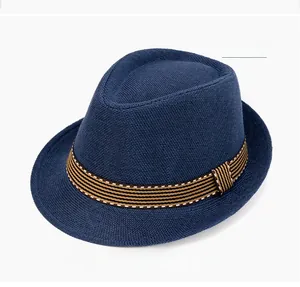 Close-up of navy blue linen fedora hat featuring a striped decorative band and textured weave
