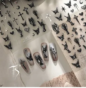 Detail of TL-435 gothic nail stickers with black 3D relief angel and cross designs