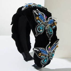 Elegant black velvet headband featuring beaded butterfly patterns with crystals and pearls