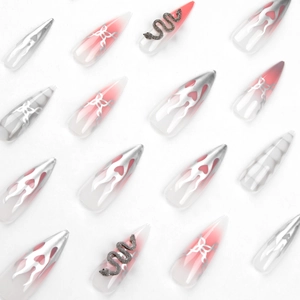 Y2K silver flame and snake press-on nails with pink gradient and rhinestones