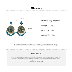 Detail view of Bohemian tassel earrings with dimensions and rhinestone materials