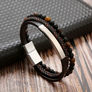 Detail view of multi-layer leather bracelet with tiger eye beads and magnetic clasp
