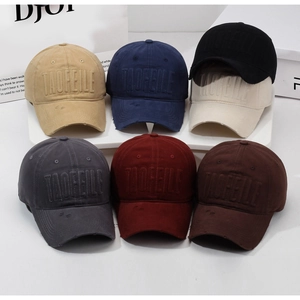 Detailed collection of vintage distressed baseball caps with 3D letter embroidery