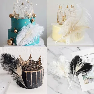 Elegant ostrich feather and pearl cake toppers with golden crown for dessert decoration