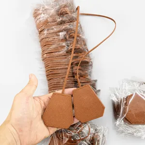 Litchi pattern leather magnetic hat clip for outdoors, caramel brown bag accessory