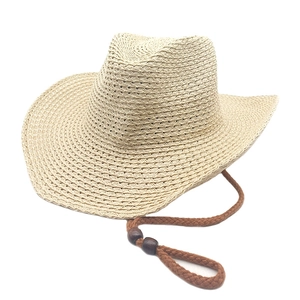 Classic beige woven straw cowboy hat with brown chin strap for beach sun protection