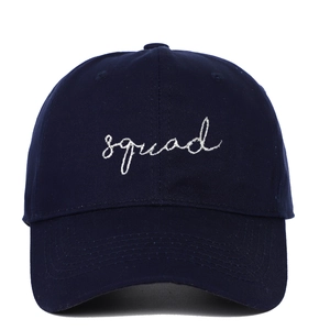 Navy blue cotton baseball cap with white SQUAD embroidery on a plain white background
