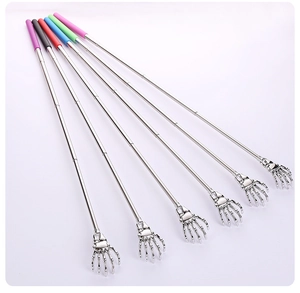 Detailed view of six colorful telescopic back scratchers with skeleton hand design