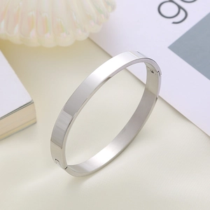 Minimalist silver stainless steel clasp bangle with polished flat rectangular surface