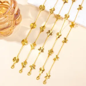 Elegant gold-plated charm bracelets with clover, butterfly, and star designs for women