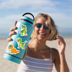 Cute cartoon dinosaur stickers on a light blue water bottle with a sunny beach background