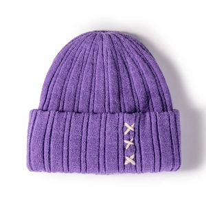 Purple ribbed knit beanie with white X-stitch embroidery for winter warmth
