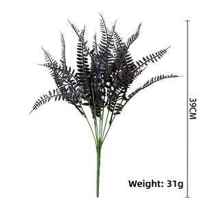 Detail of 39cm black artificial Boston fern leaf showing sawtooth texture and 31g weight