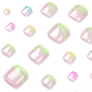 Press on toenails featuring colorful four-color geometric lines on nude base