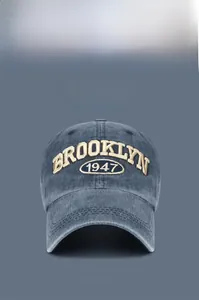 Detailed embroidery of BROOKLYN 1947 on washed cotton vintage baseball cap