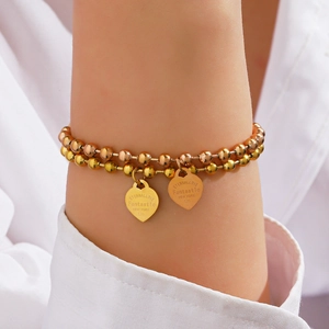 Double-layer stainless steel beaded heart bracelet with engraved gold pendants