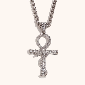 Silver-toned Ankh cross snake pendant with sparkling rhinestones on woven chain necklace