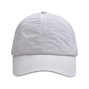 Detail of white quick-dry sun visor showing lightweight crinkled nylon fabric texture