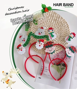 Detail of Christmas headband set featuring 3D Santa, Snowman and Elf felt designs