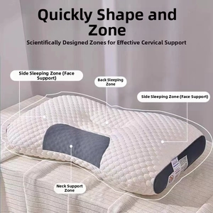 Close-up of ergonomic neck pillow showing breathable honeycomb fabric and functional sleep zones