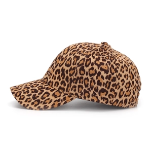 Close-up of leopard print baseball cap with six-panel design and curved brim texture