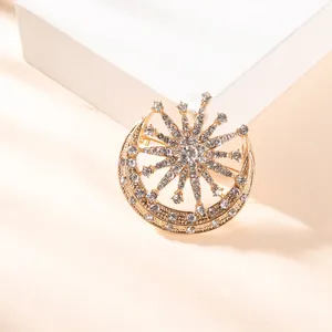 Exquisite gold moon and star brooch with sparkling rhinestones in a vintage palace style
