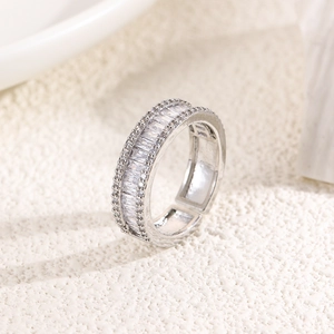 Detail view of the square zircon inlay and adjustable silver-plated band texture