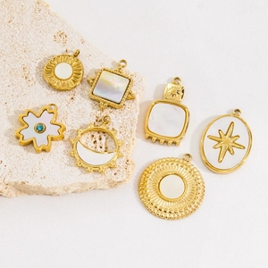 Set of 7 14K gold plated stainless steel pendants with white shell inlay in various shapes