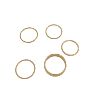 Minimalist stackable gold-plated stainless steel ring set with five polished bands