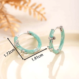 Winter vintage mint green enamel bow hoop earrings with unique bamboo joint metal design