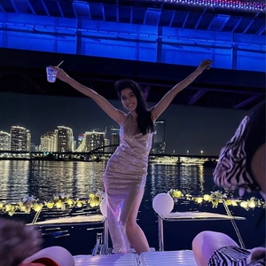Elegant beige sequin halter maxi dress with backless design and high slit for evening parties
