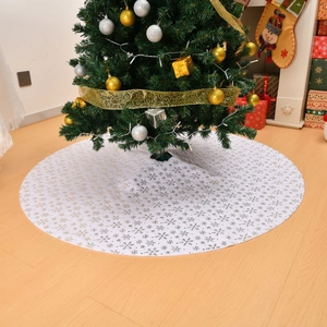 White plush Christmas tree skirt featuring elegant gold and silver sequin snowflake patterns