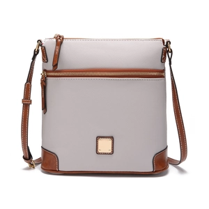 Detail of lychee grain leather texture and gold-tone zipper on gray crossbody bag