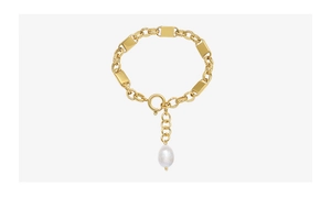 Detail view of 18k gold plated chain bracelet with a white teardrop freshwater pearl pendant