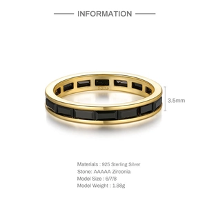Macro shot of 925 sterling silver gold plated ring with black rectangular zirconia