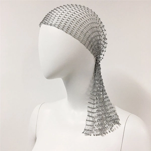 Detailed view of silver mesh headband with sparkling rhinestones for party hair styling
