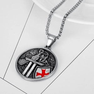 Silver crusader knight shield pendant necklace with red cross detail on white background
