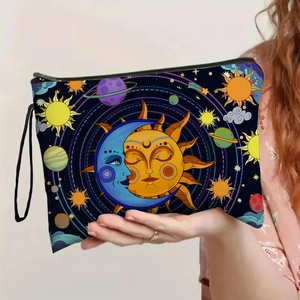 Cosmetic bag with sun and moon celestial prints featuring stars and planets patterns