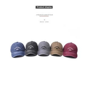 Group display of five vintage washed cotton baseball caps with California 1987 embroidery