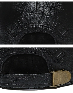 Detail of genuine leather baseball cap showing lychee texture and adjustable metal buckle