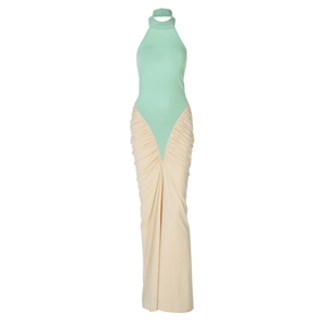 Detail view of the halter neck stitching and mint green pleated contrast dress design
