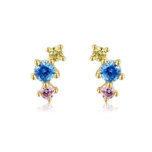 Close-up of 18K gold earrings with vertical yellow blue and pink zircon stones